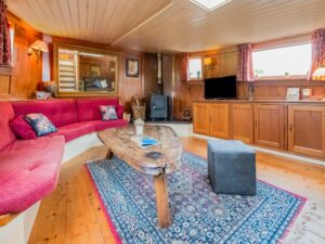 Woonkamer authentiek schip - Belvilla Zandmeren Kerkdriel